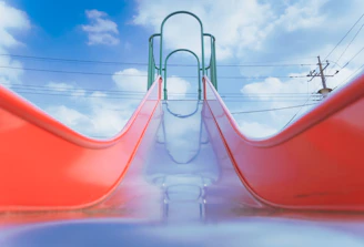 Close-up of a colorful kidplay slide freshly installed in a park.