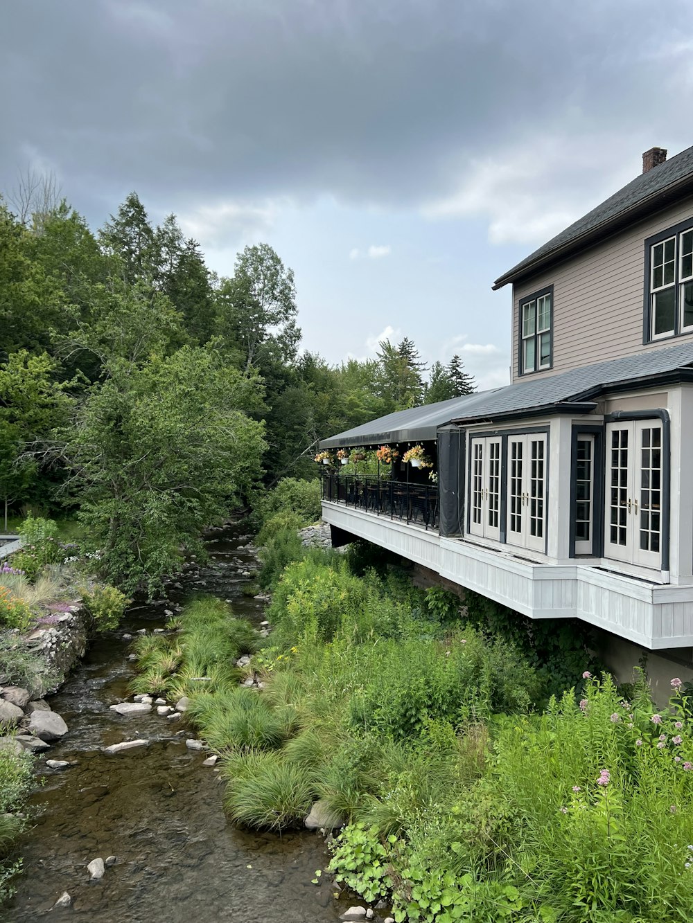 a house with a river running underneath it