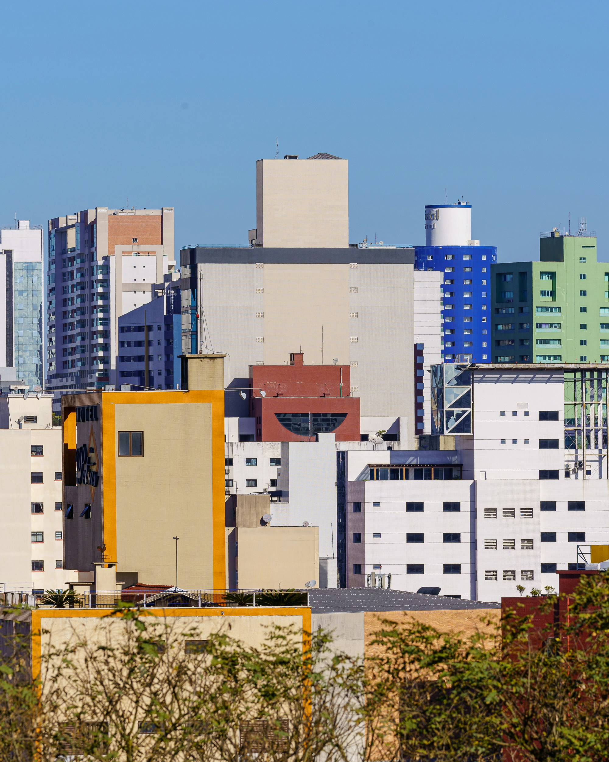 a view of a city with tall buildings