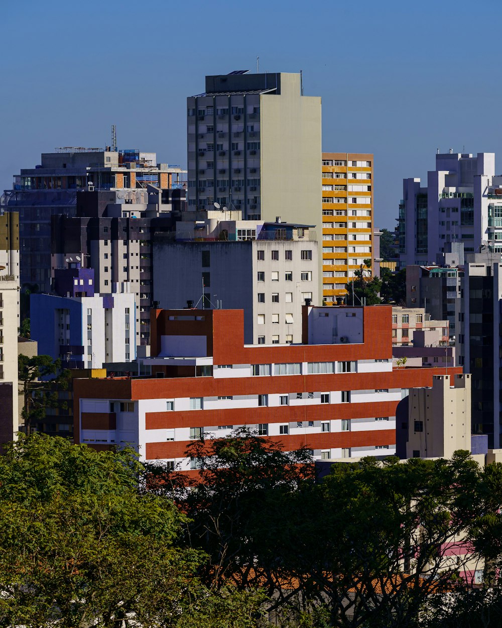 a view of a city with tall buildings