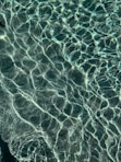 a person standing in a pool of water