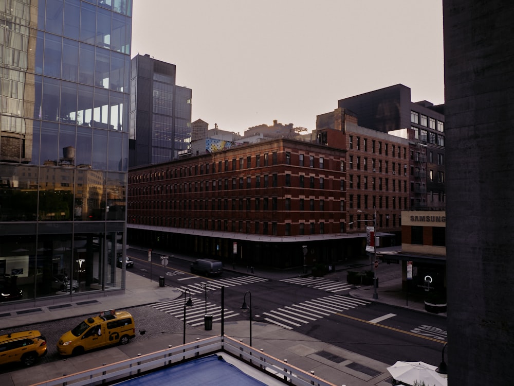 a view of a city street from a high rise building