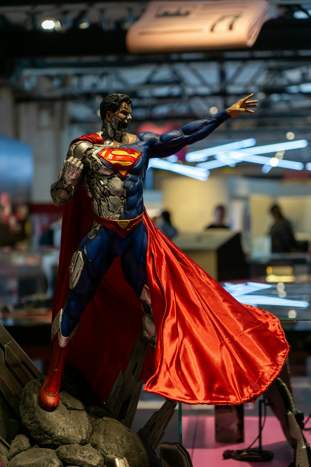 a statue of a man in a superman costume