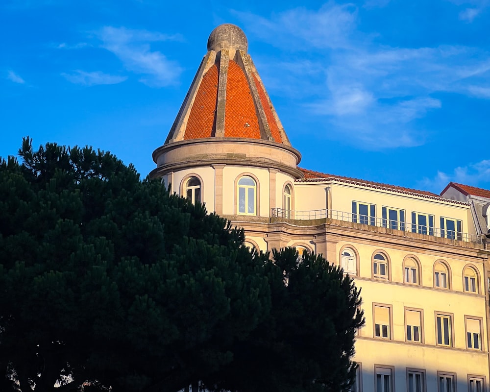 a tall building with a clock on the top of it