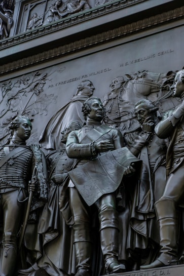 a close up of a statue of a group of people