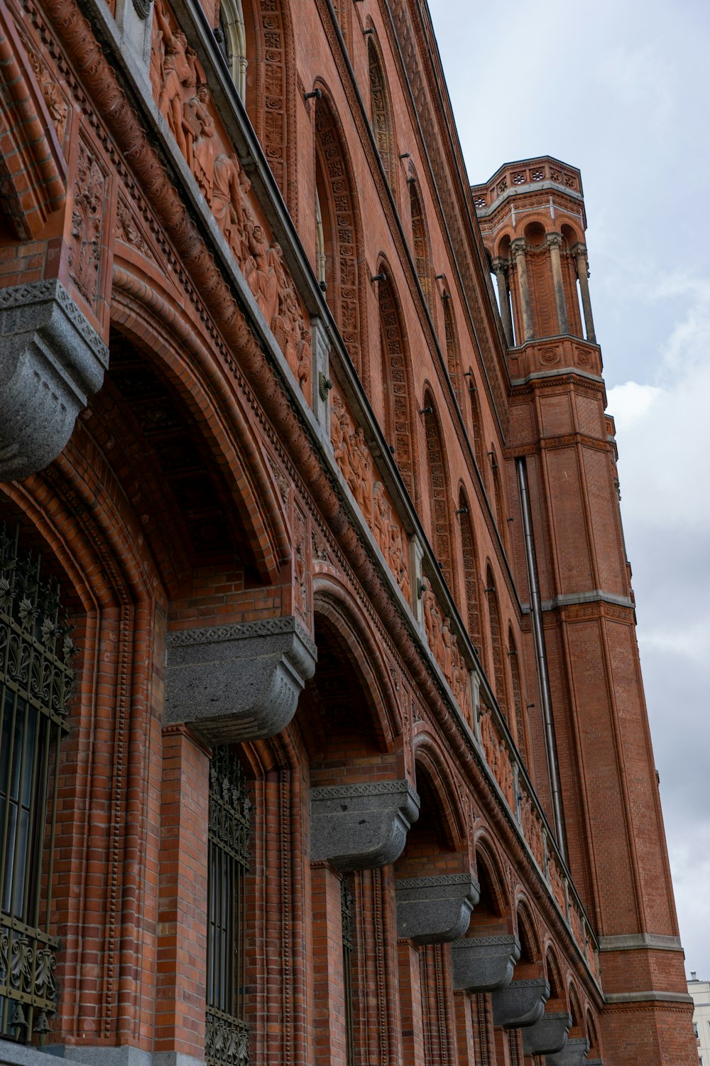 a tall building with a clock on the front of it