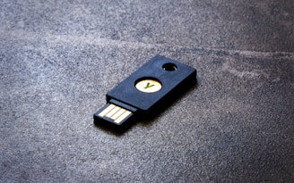 a close up of a usb stick on a surface