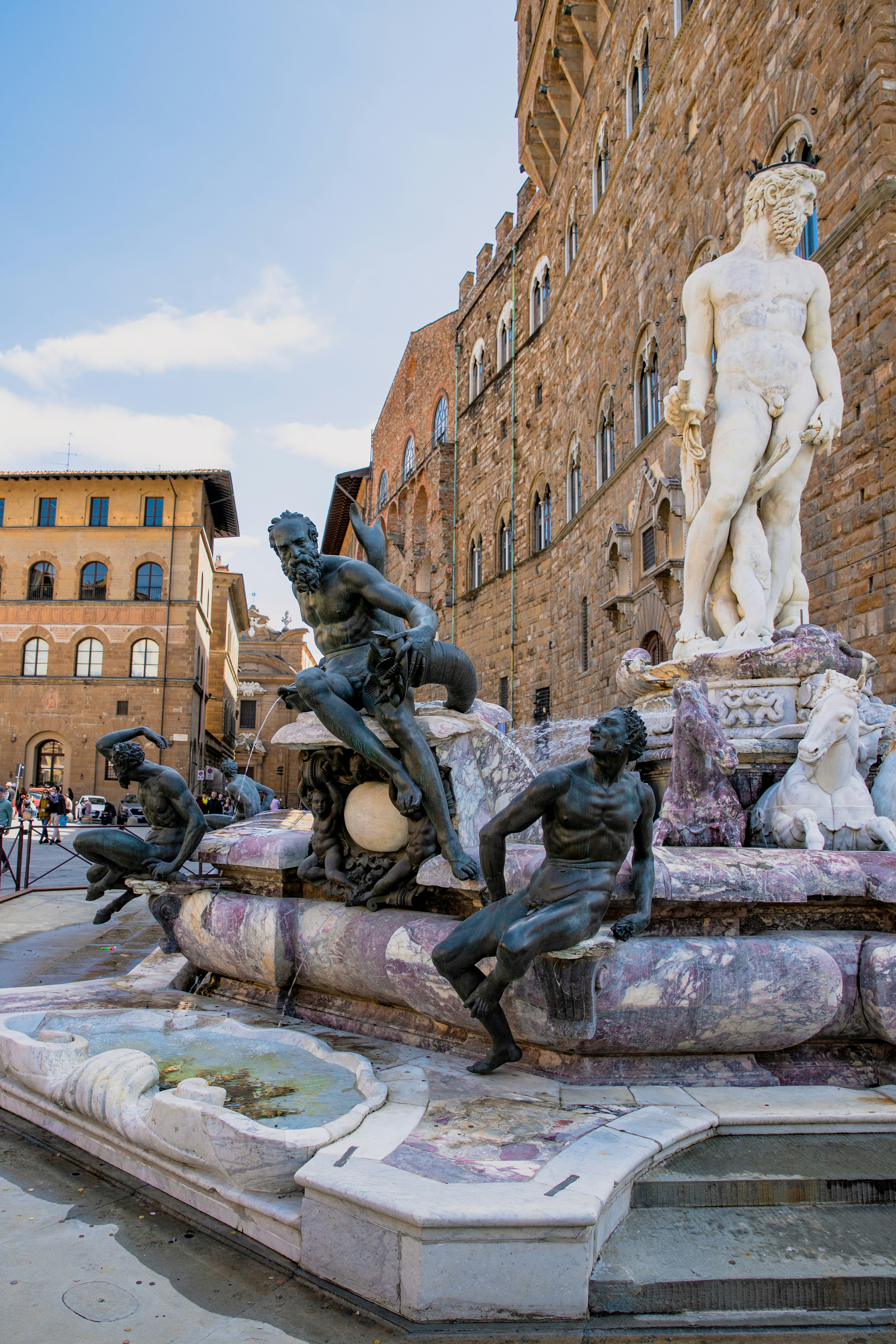 A statue of a man falling from a fountain photo Free Florence Image