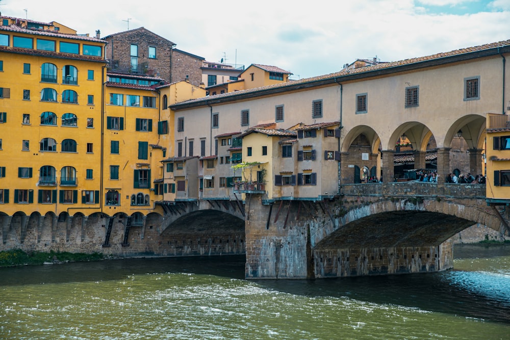 a bridge over a river in a city