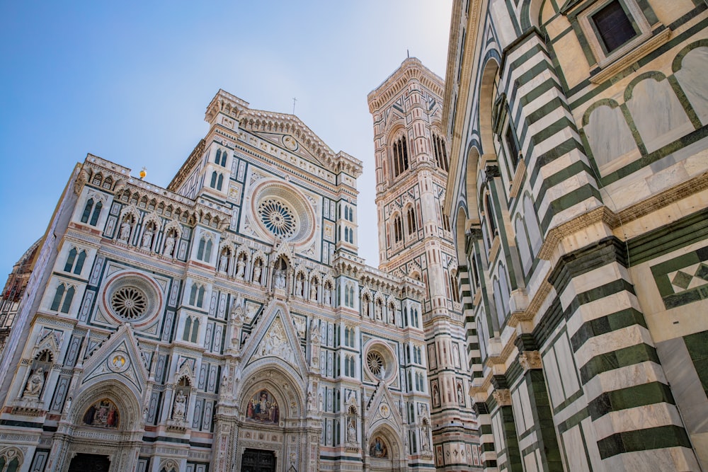 a large cathedral with a clock on it's side