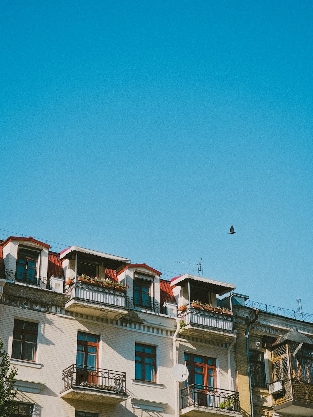 a tall building with balconies and balconies on the balconies