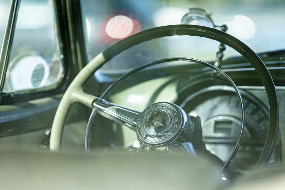 a steering wheel and dashboard of a car