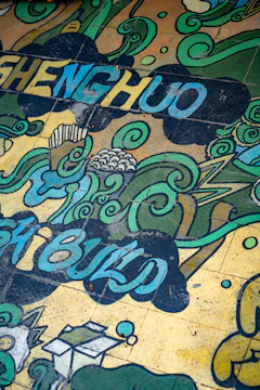 A vibrant mural showcasing swirling nebula colors intertwined with lush green leaves and cosmic elements.