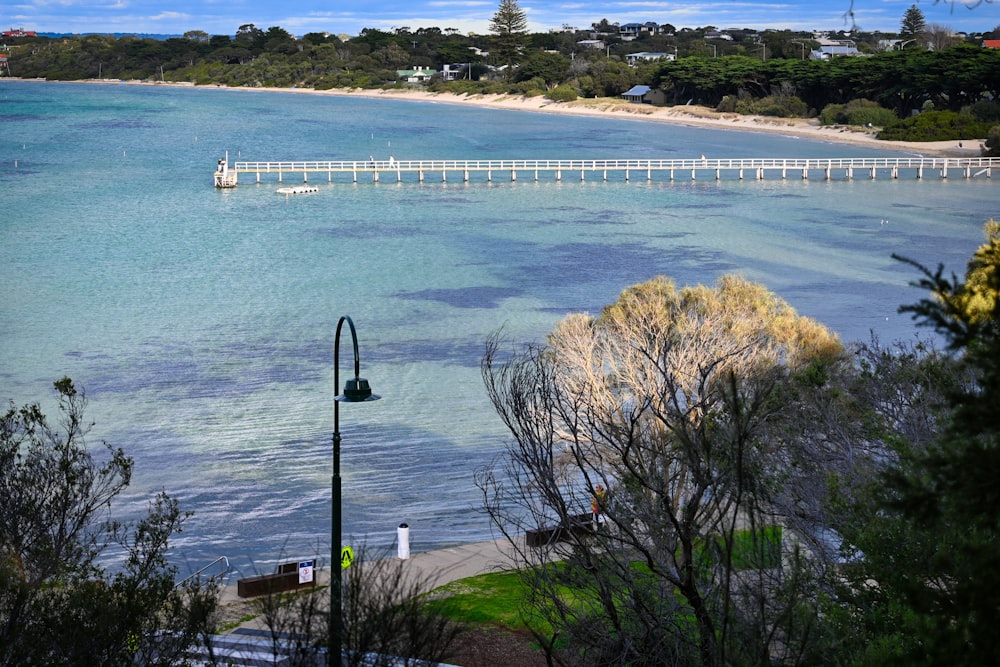 a view of a bridge over a body of water