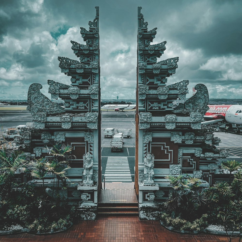 a couple of gates that are next to a runway