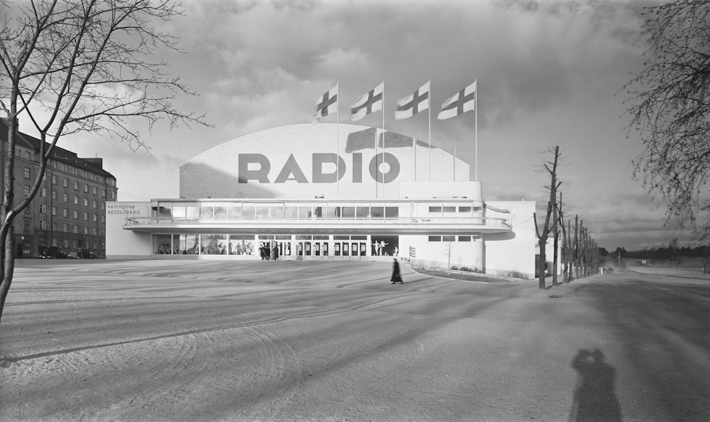 a black and white photo of a radio building