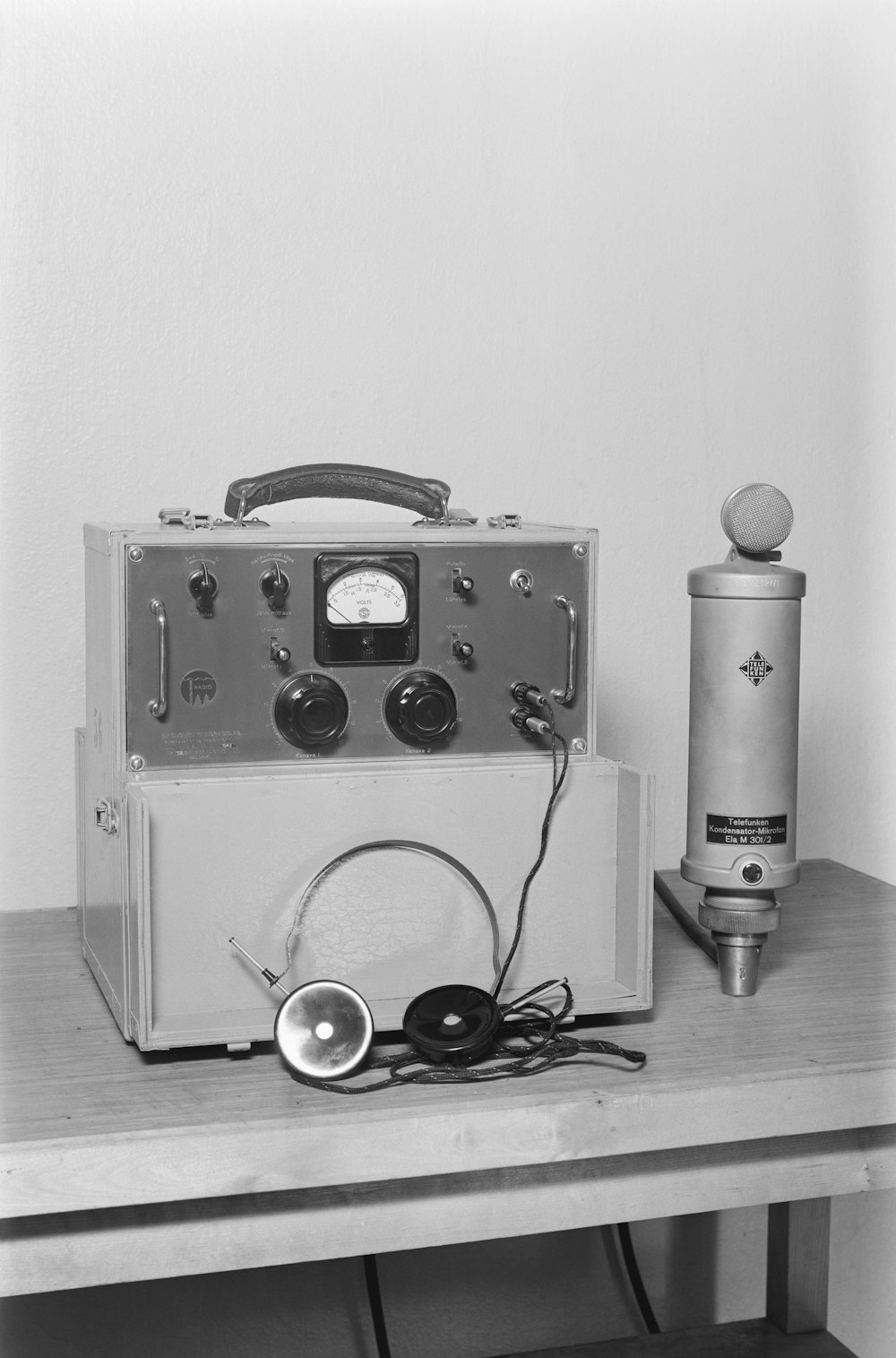 a radio sitting on top of a wooden table