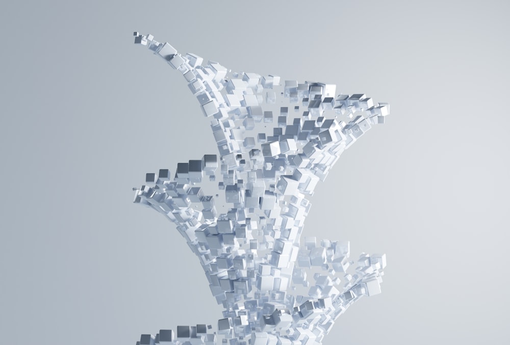 an abstract image of a white bird made of cubes
