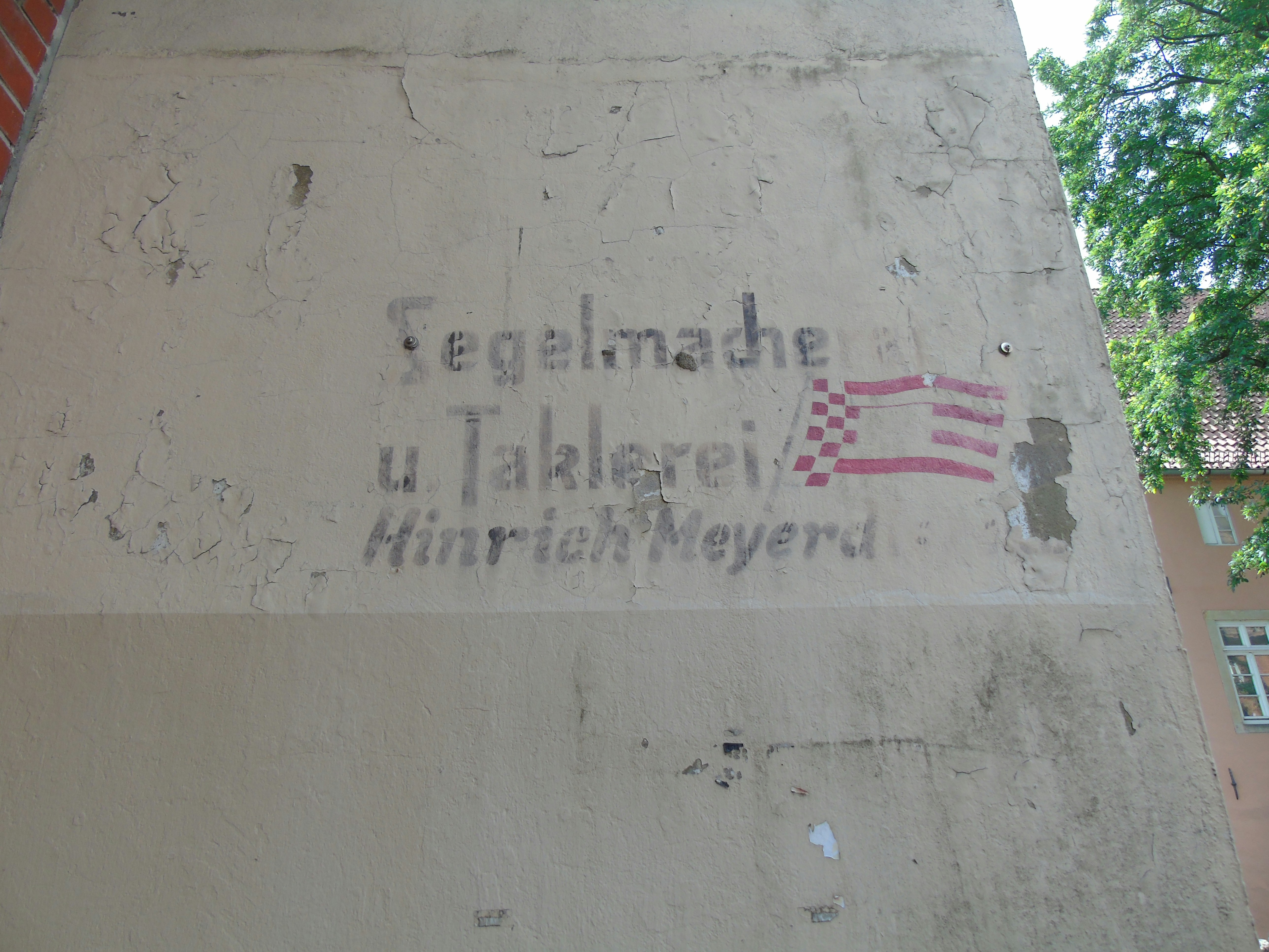 a sign on the side of a building