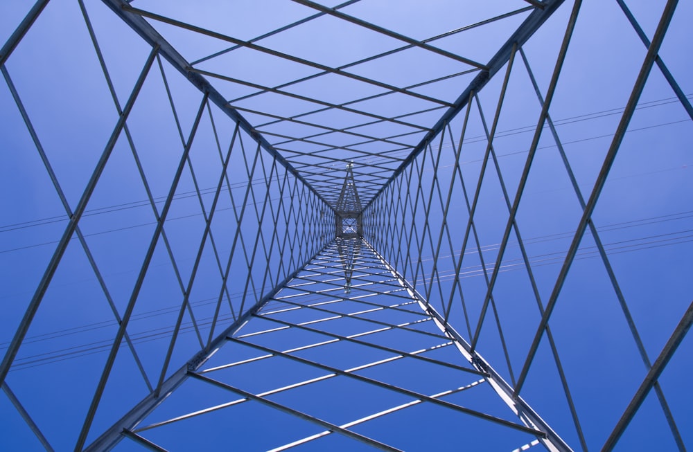 a tall metal structure with a blue sky in the background