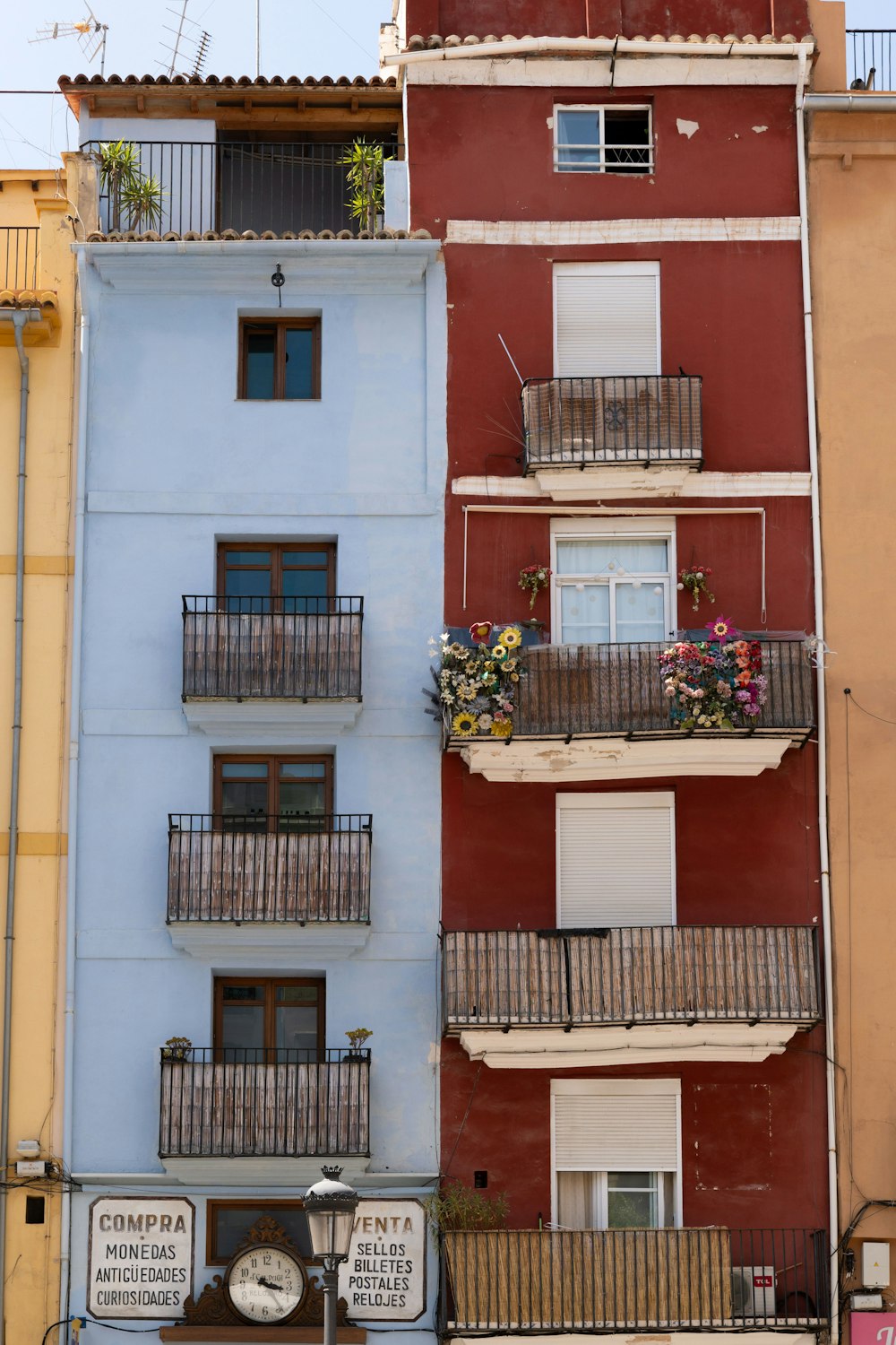 a tall building with balconies and balconies on the balconies