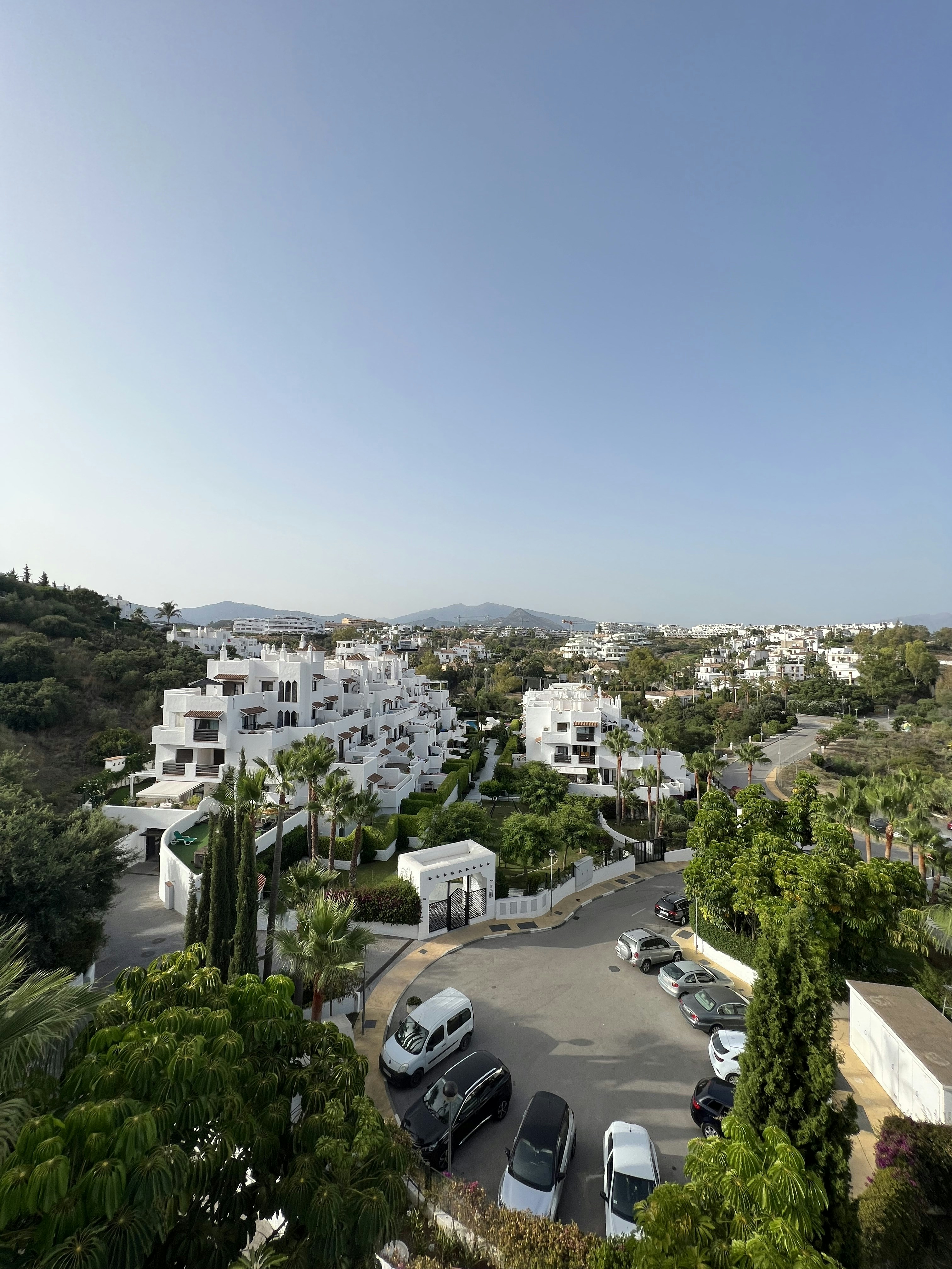 a parking lot with cars parked in it