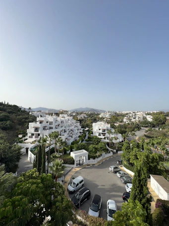 a parking lot with cars parked in it