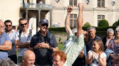 Excursion group celebrating arrival at a contest venue