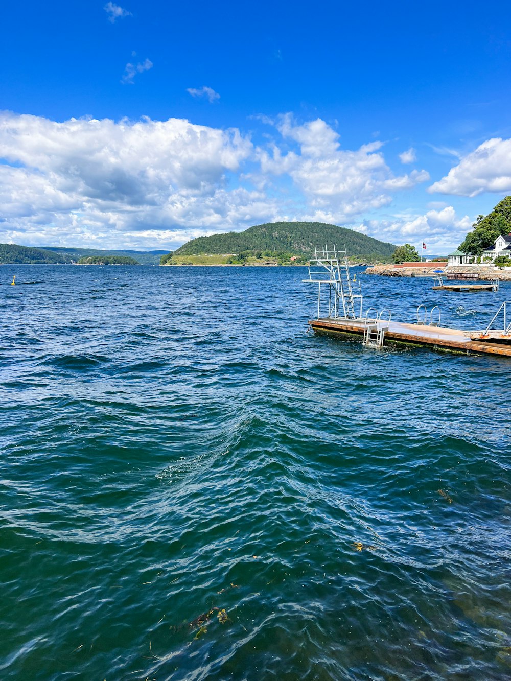 a large body of water with a boat in it