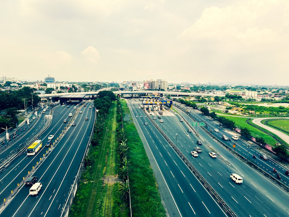 an aerial view of a highway with many cars on it