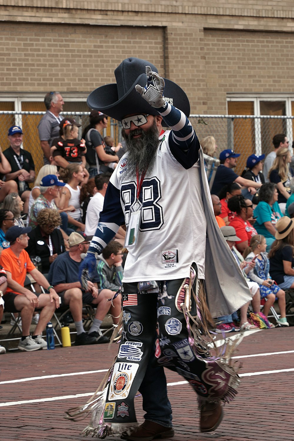 a man in a pirate costume walking down a street