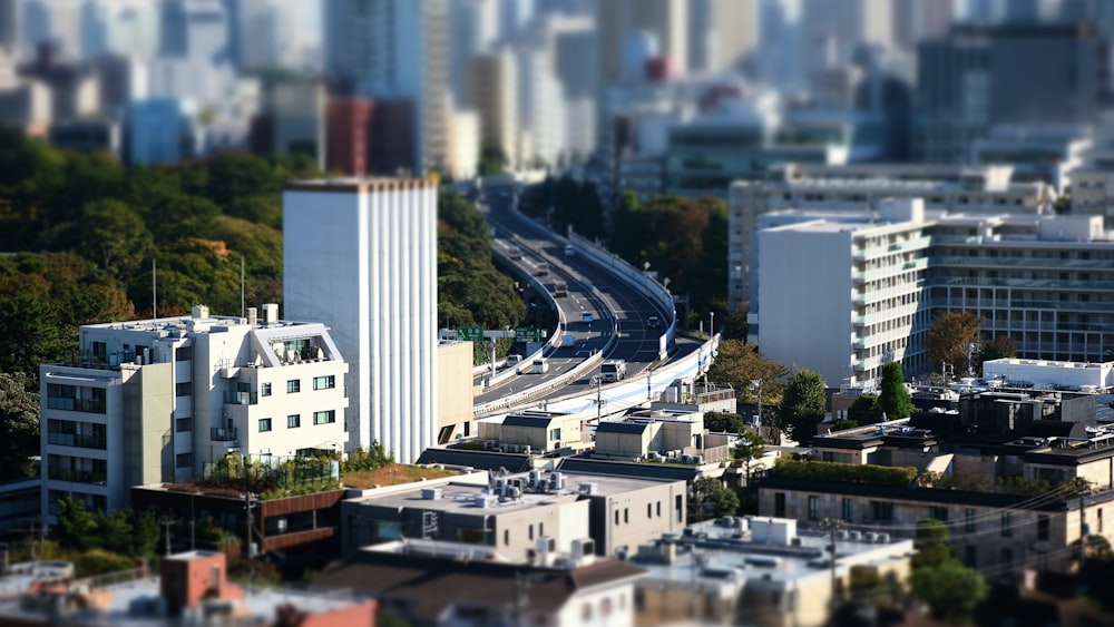 an aerial view of a city with tall buildings