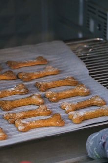 a bunch of dog bones on a grill