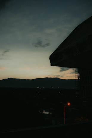 A cinematic still of a cityscape at dusk, highlighting the mood and tone of a recent video.