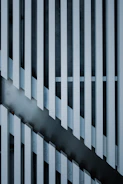 a black and white photo of smoke coming out of a window