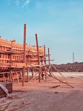 Close-up of sturdy wooden formwork panels being assembled on a construction site.