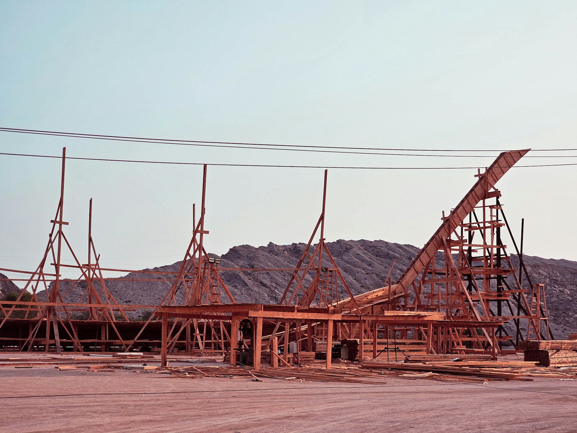 woman wearing yellow long-sleeved dress under white clouds and blue sky during daytime