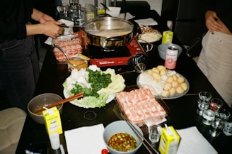 a table topped with lots of different foods