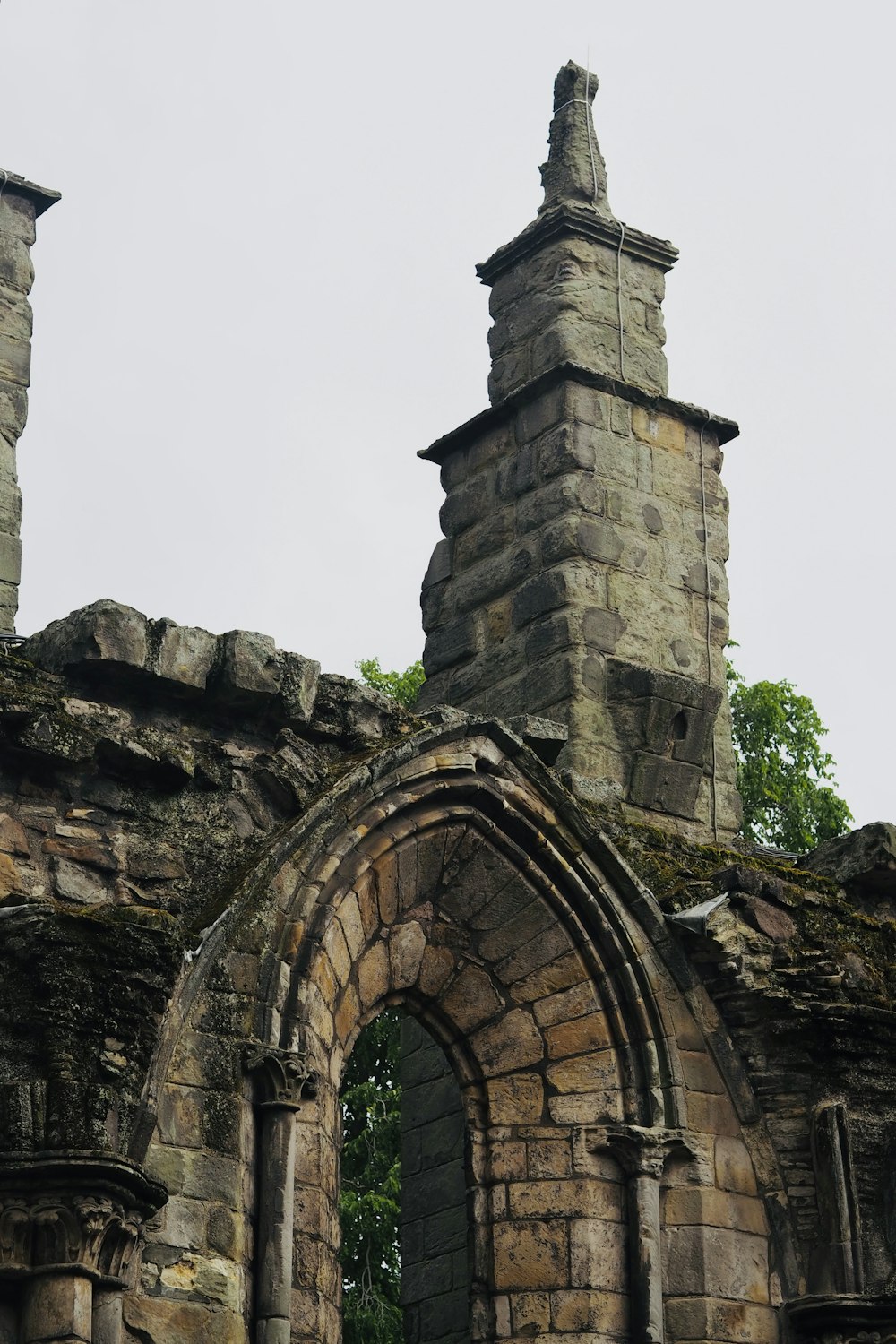 an old stone building with a clock tower