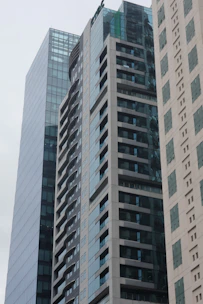 Modern commercial and residential buildings representing real estate development.