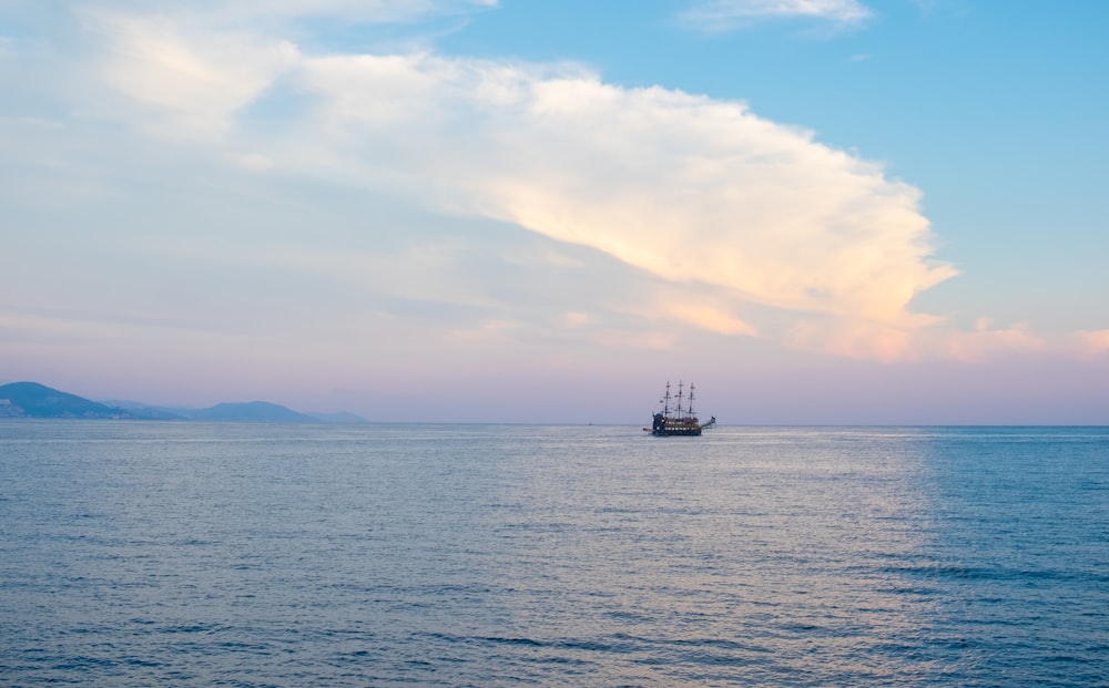 a boat is out in the open water