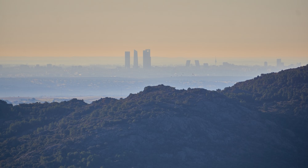 a view of a city from the top of a mountain