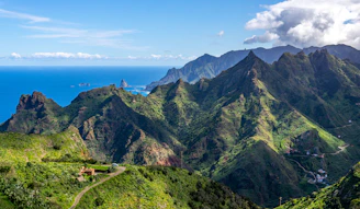 a scenic view of the mountains and ocean