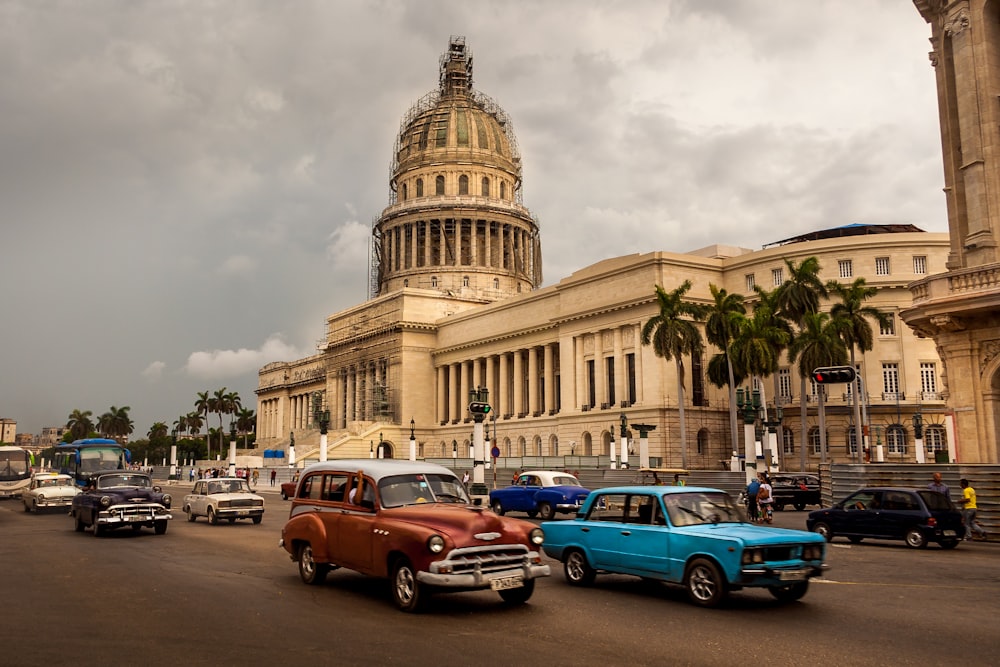 a city street filled with lots of old cars