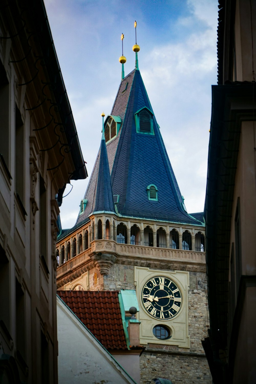 a tall clock tower with a sky background