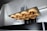 A close-up of dental prosthetic materials arranged neatly on a workbench.