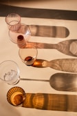 a number of wine glasses on a table