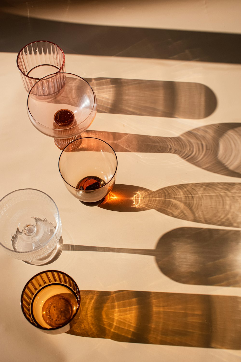 a number of wine glasses on a table