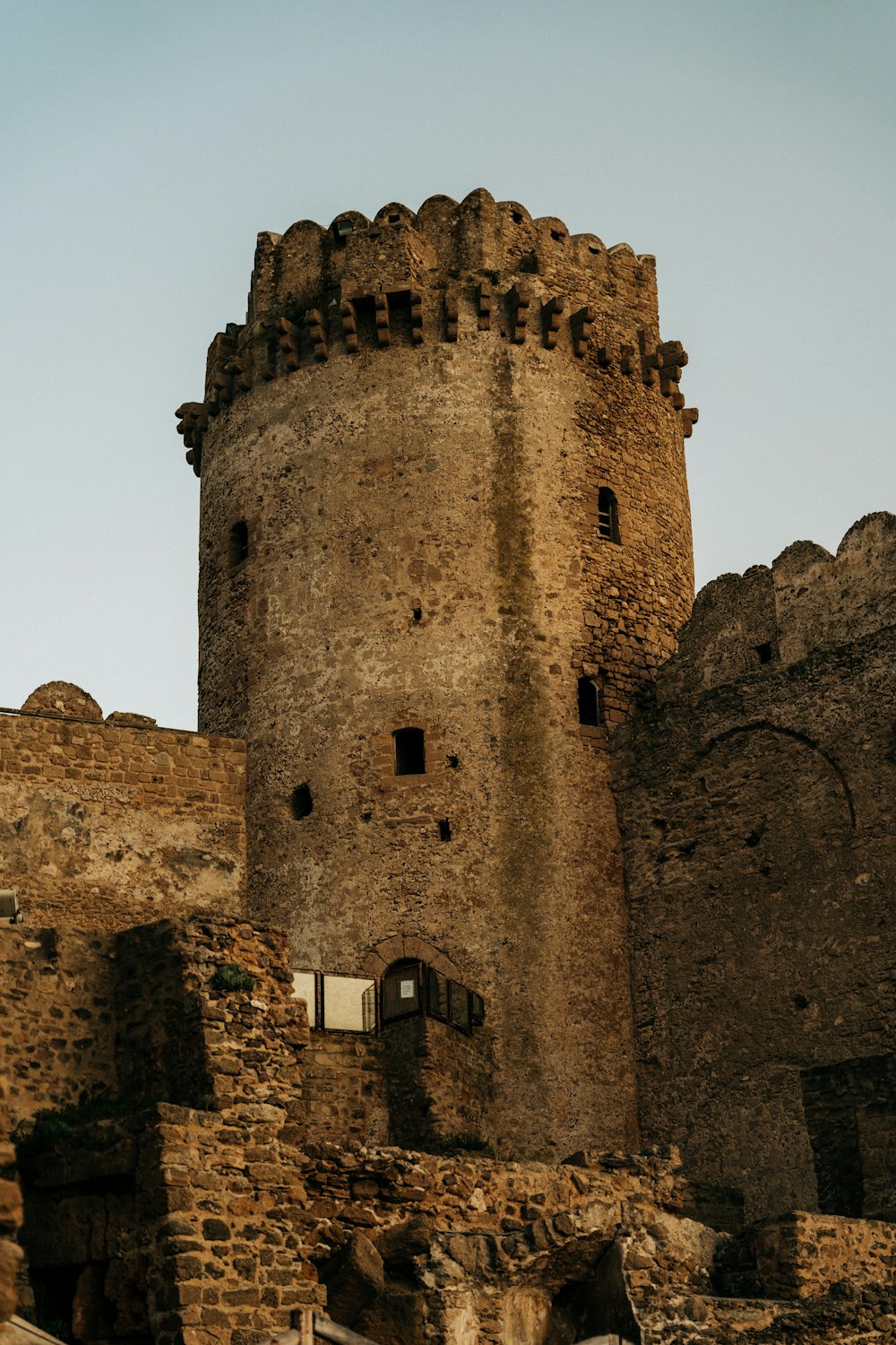 a tall tower with a clock on the top of it