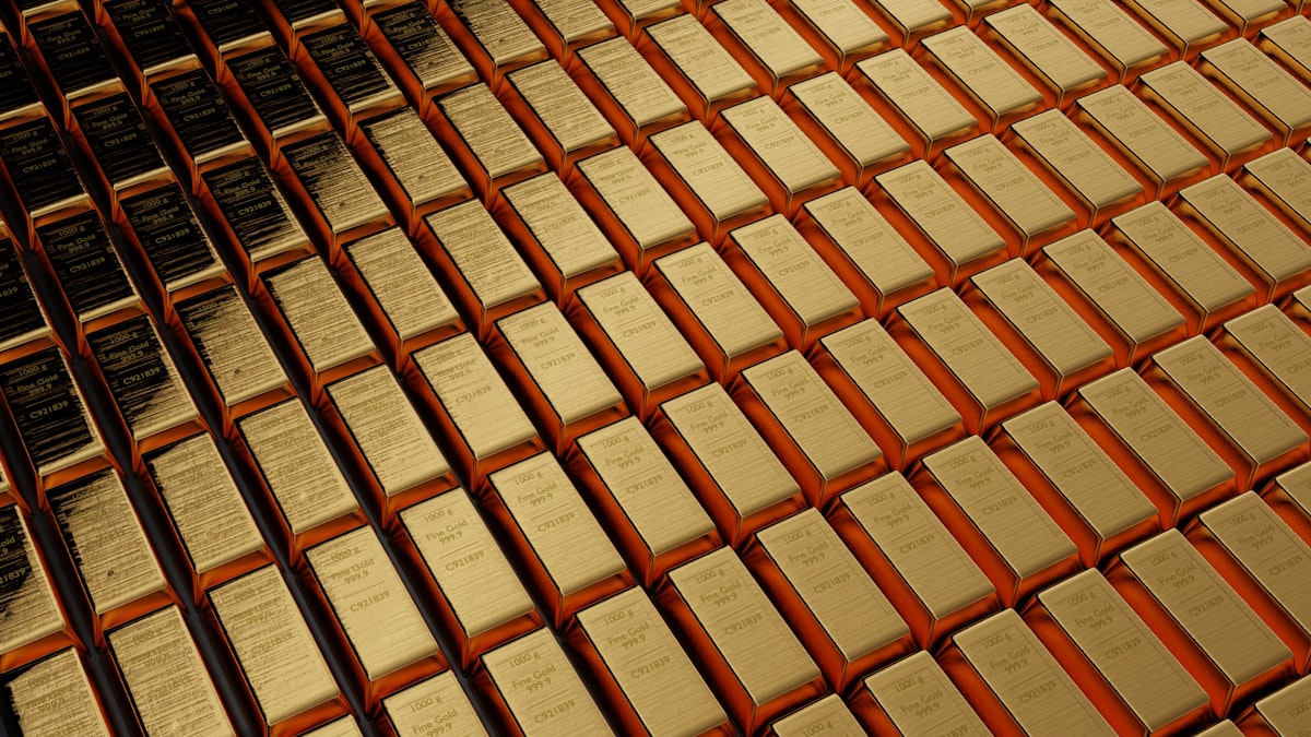 Gold bars stacked representing wealth management and long-term investing
